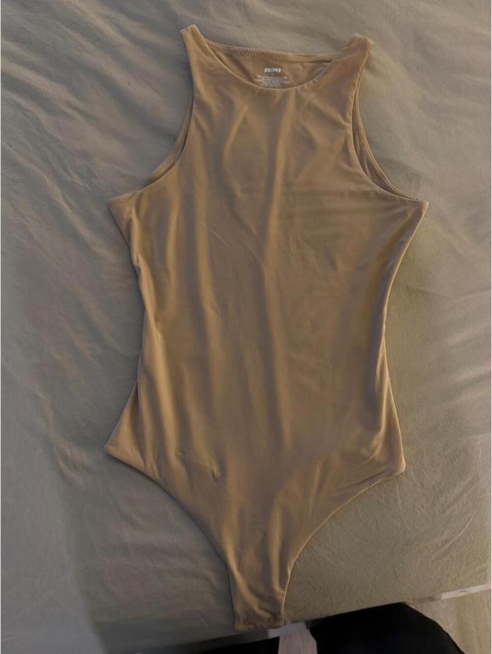Skims tan bodysuit